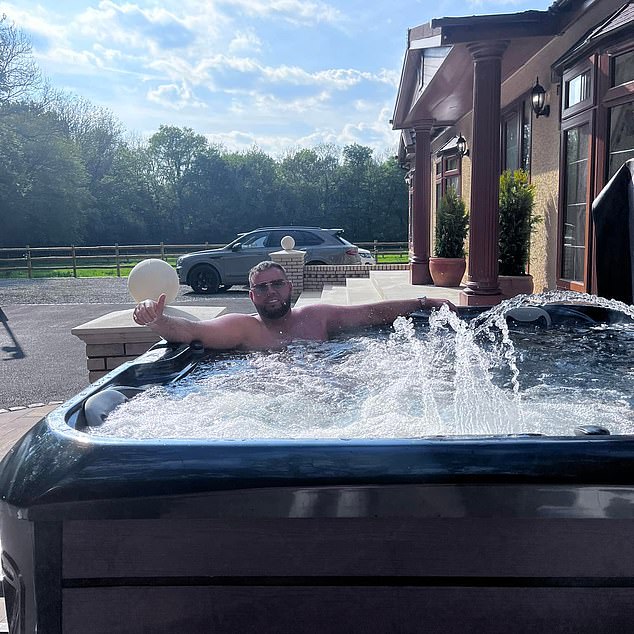 Frank Tomney in hot tub outside 'static caravan' on site next to Mr McCorquodale's home