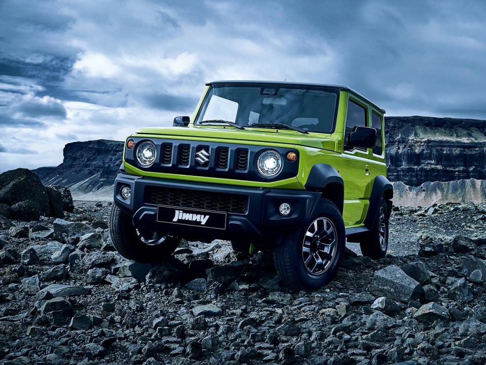 Suzuki Jimny on a rocky terrain.