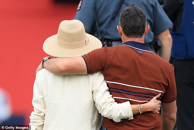 She and Rory left the course arm-in-arm, and it was reported that Erica was in tears