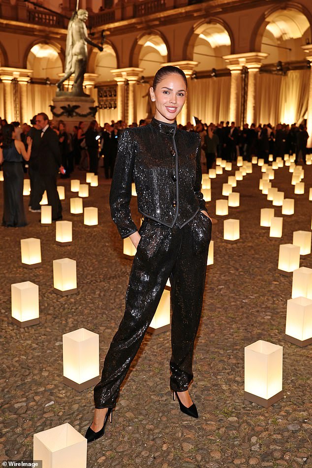 Eiza, 35, wore a beaded collared jacket with a coordinating pair of straight leg trousers and heels