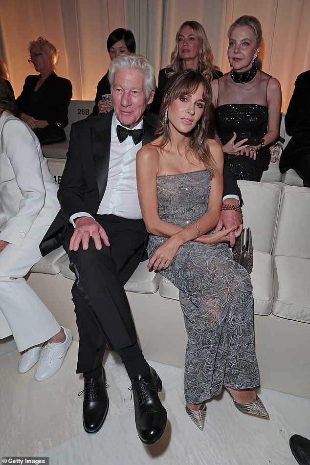 Alejandra stunned in a sheer sparkly silver dress as she slipped into a pair of pointed stilettos