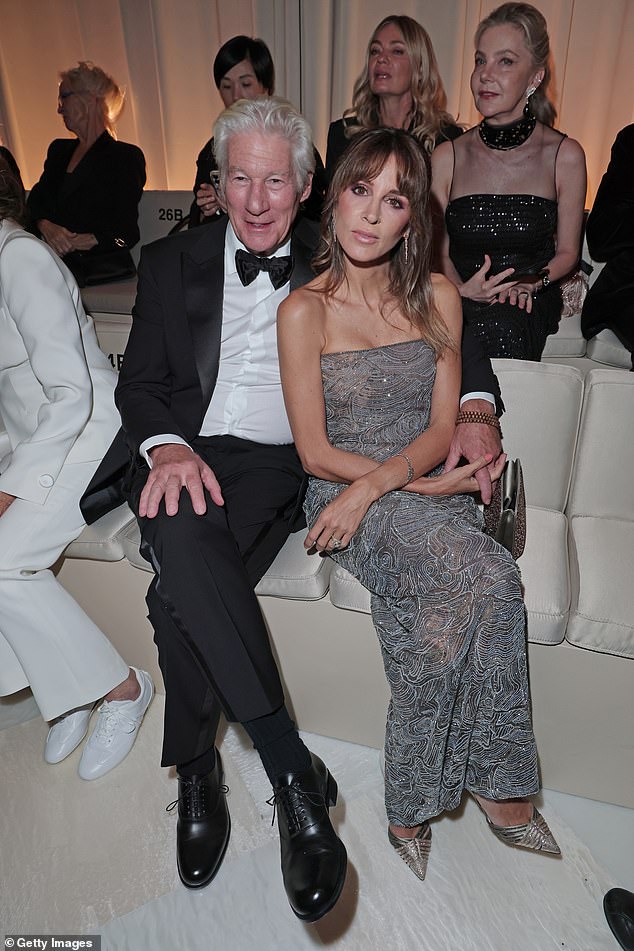 The pair looked smitten together as they sat front row hand-in-hand ready to watch the new Spring/Summer 2026 collection