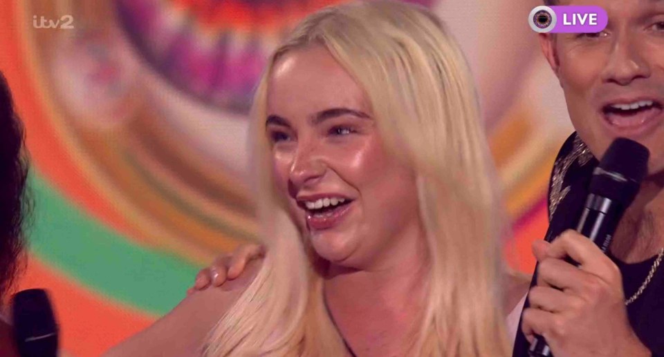 Emily enters the Big Brother house.