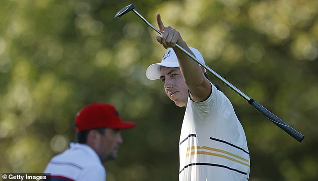 FARMINGDALE, NEW YORK - SEPTEMBER 28: Matt Fitzpatrick (R) of Team Europe celebrates after a birdie putt to win the 13th hole in front of Captain Keegan Bradley of Team United States during the Sunday singles matches of the 2025 Ryder Cup at Black Course at Bethpage State Park Golf Course on September 28, 2025 in Farmingdale, New York. (Photo by Harry How/Getty Images)