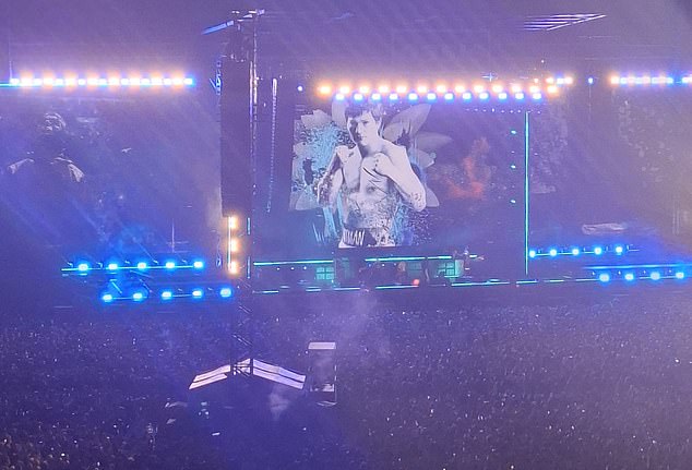 The band also dedicated hit Live Forever to boxer and fellow Mancunian Ricky Hatton, who tragically died earlier this month at the age of just 46 (pictured, their tribute to the athlete at Saturday night's show)