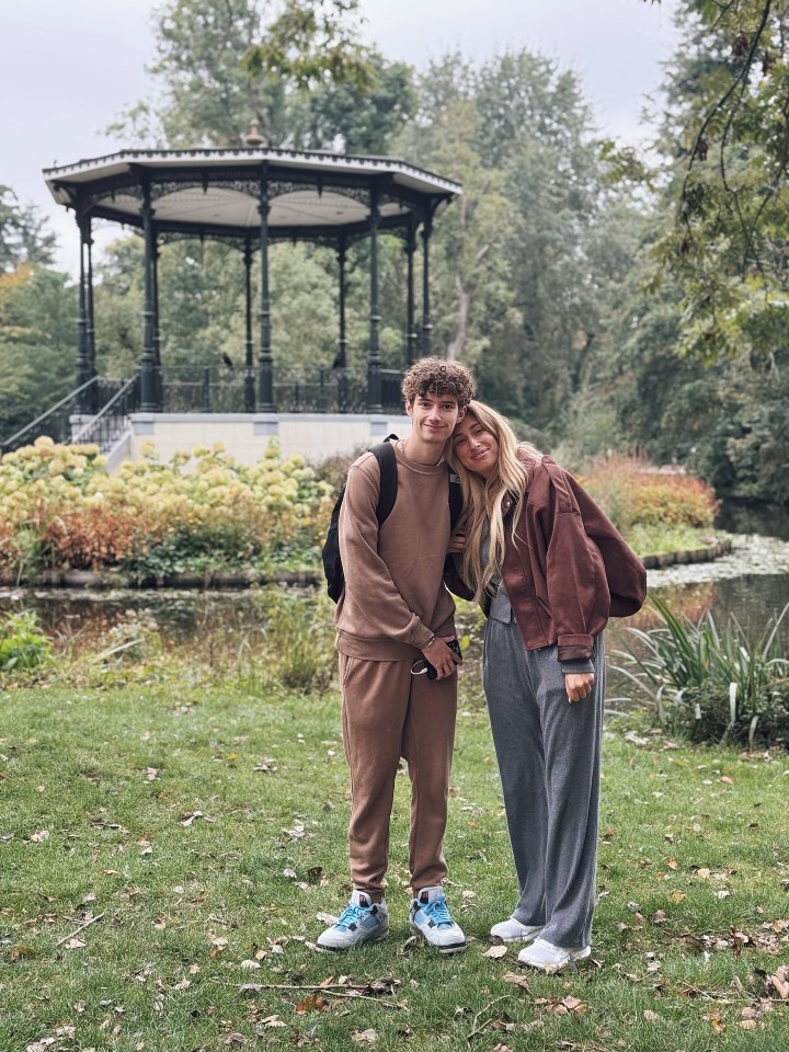 Stacey Solomon with her son Zach in a park with a gazebo in the background.
