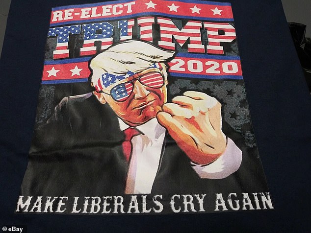 The shirt, which sells for $15.95 on eBay, has a cartoon style picture of Trump with his fist in the air, and reads: Re-elect Trump 2020