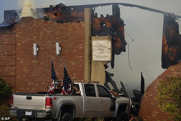 The shooter's truck had two American flags attached to the back