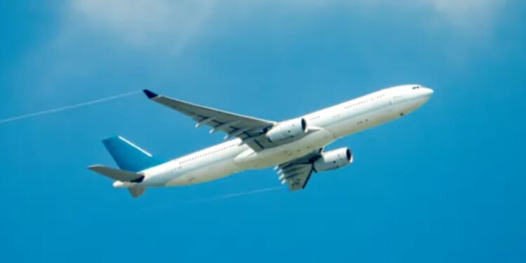 Footie fans while away half-time of 0-0 bore draw by PLANE SPOTTING after tip in matchday programme