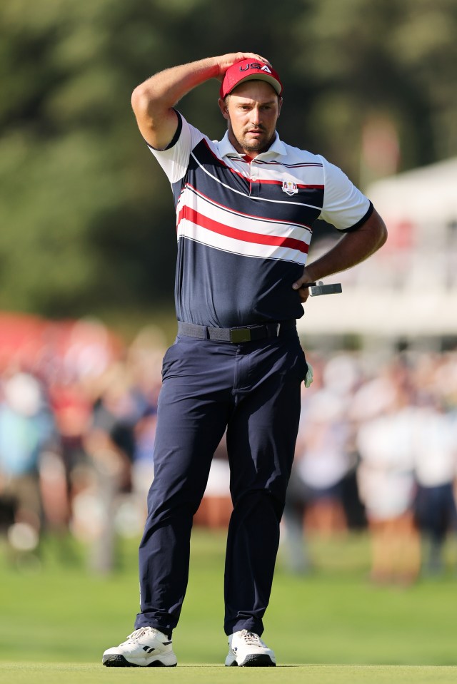 Bryson DeChambeau of Team United States reacts to a missed putt on the 16th green.