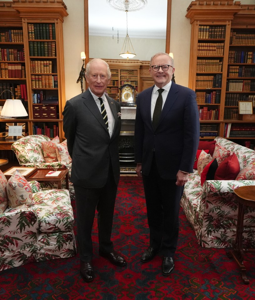 King Charles III and Australian Prime Minister Anthony Albanese posing for a photo.