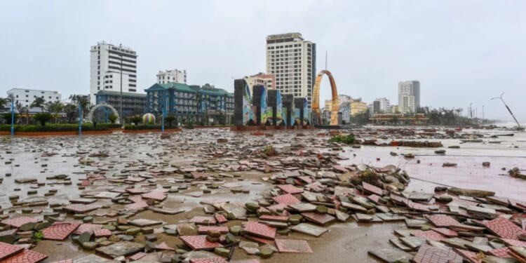 Deadly super storm with 83mph winds leaves nine dead and dozens missing as typhoon Bualoi hits Vietnam