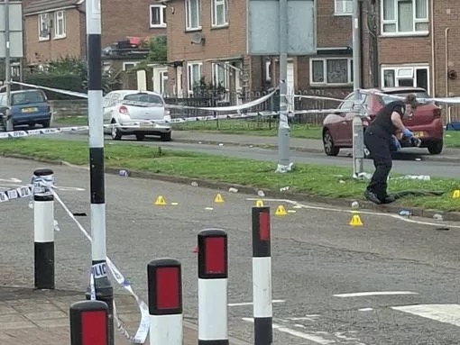 Police investigating a car collision with pedestrians.