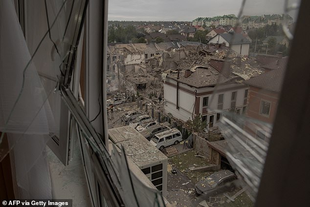 In Ukraine Russia launched a 12-hour aerial strike on Kyiv which killed at least four people, including a 12-year-old girl. Pictured: Kyiv, on September 28