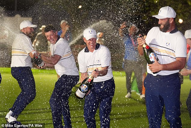 Team Europe captain Donald celebrates with McIlroy by his side after Europe's historic win on US soil
