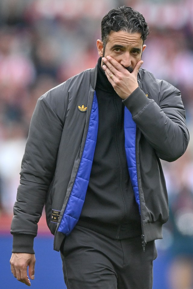 Manchester United manager Ruben Amorim looks dejected during a football match.