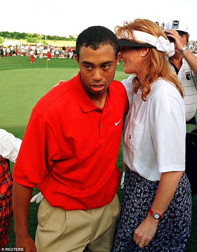 After Woods' victory at the tournament in Texas, the pair embraced while Fergie beamed