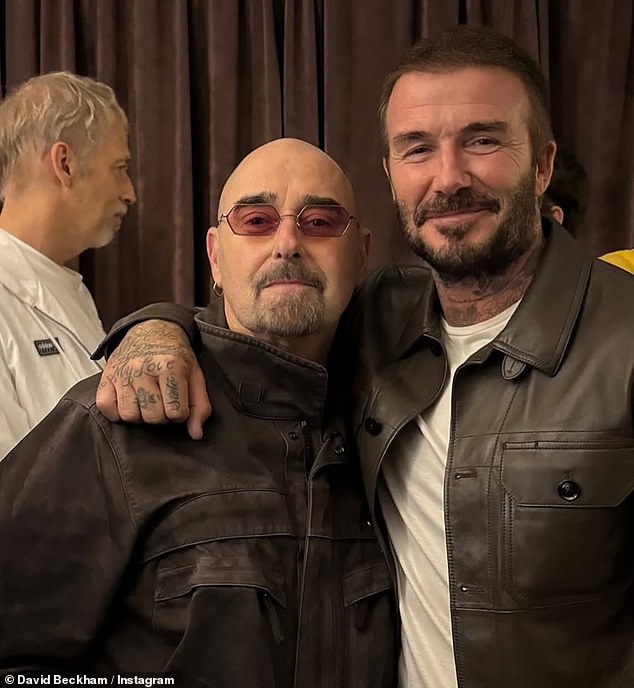 The happy family laughed, sang, hugged and posed with each other and friends, while David also met Oasis band member Paul "Bonehead" Arthurs