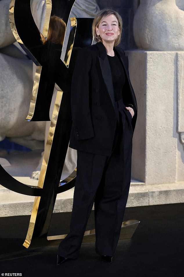 The Bridget Jones star was in high spirits as she arrived for the fashion show