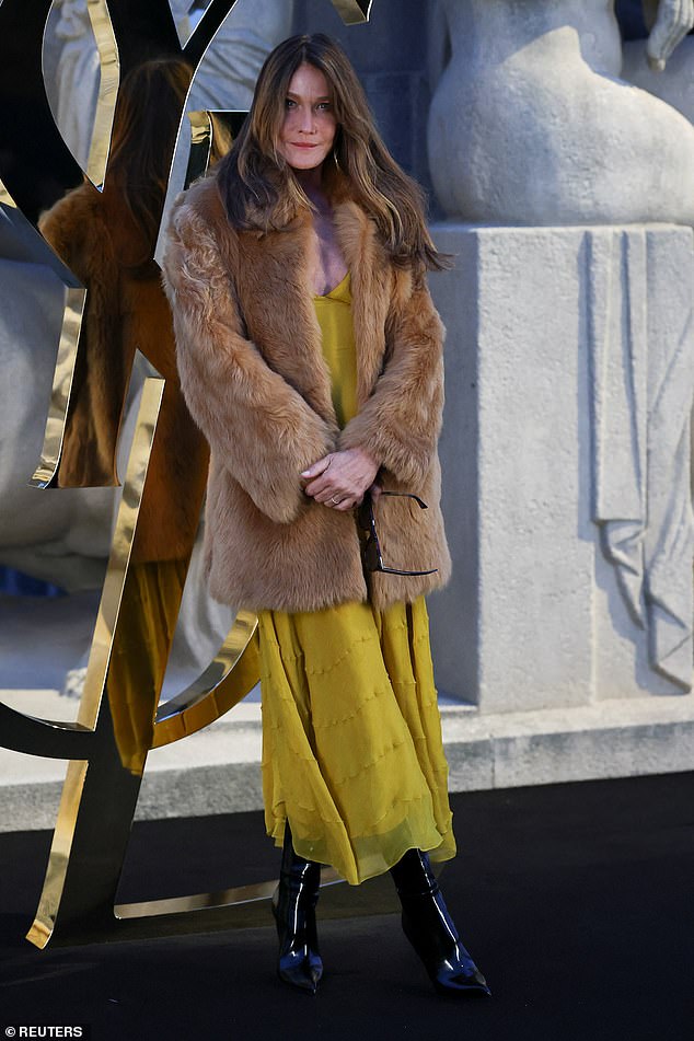 Following the news that her husband, former French President Nicolas Sarkozy, had been sentenced to five years in prison, former model Carla Bruni put on a brave face for the show
