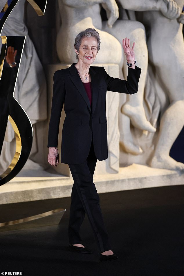 Actress Charlotte Rampling cut a glamorous figure in a sharp black trouser suit