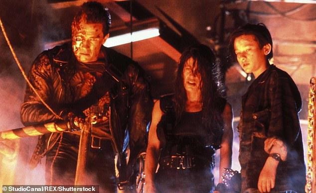 Hamilton is seen with Arnold Schwarzenegger and Edward Furlong as John Connor