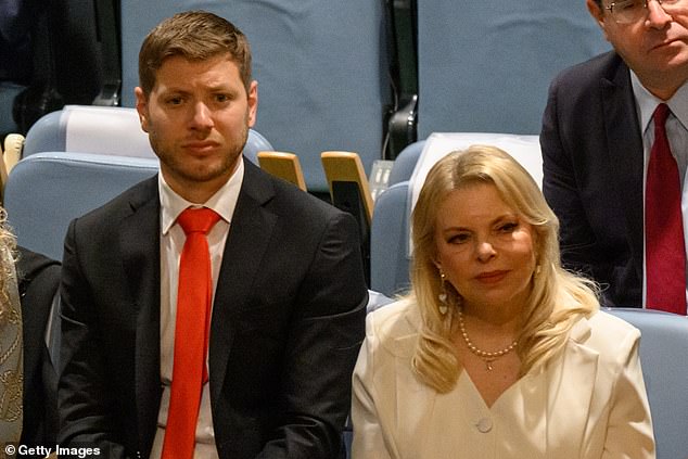 Yair Netanyahu (L) and Sara Netanyahu listen to Israeli Prime Minister Benjamin Netanyahu speech at The 80th session of The United Nations General Assembly (UNGA) on September 26, 2025 in New York City
