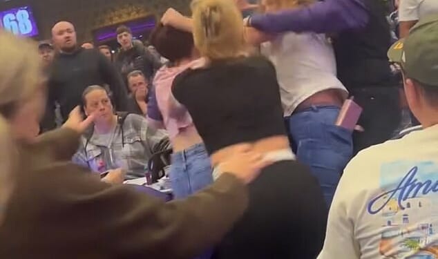 A group of women began grappling each other in the middle of the bingo hall before the full-scale brawl broke out