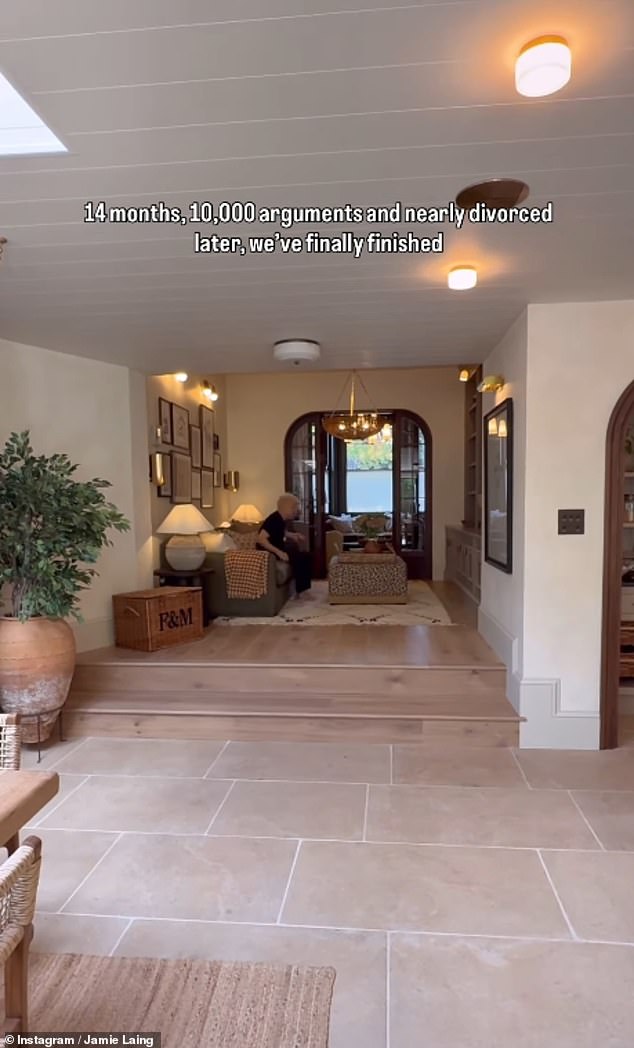Flooded with natural light courtesy of four skylights, the state-of-the art kitchen leads onto a terraced garden on one side and an open plan, living area tastefully decorated with family pictures and ornaments. It is hemmed in by lime washed walls