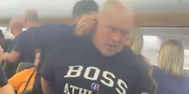 Drunk stag do Brit who was hauled off Ryanair plane by heavily armed French cops is named after he ‘tried to open door’