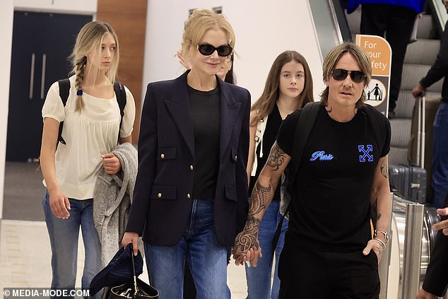 Daily Mail confirmed on Tuesday that Nicole and Keith have split after a 19-year marriage and two children. Pictured: Keith and Nicole and their daughters Sunday Rose, 17, (left) and Faith Margaret