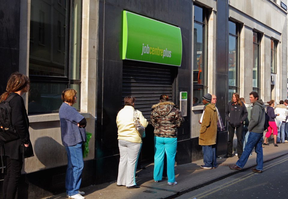 People queue outside a Job Centre.