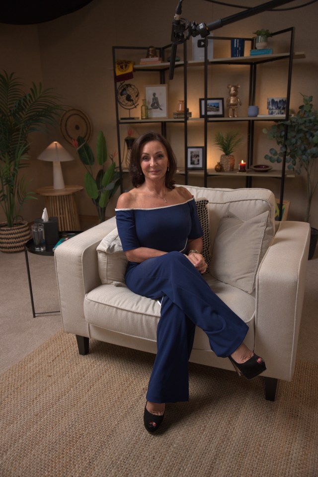 Shirley Ballas sitting on a couch.