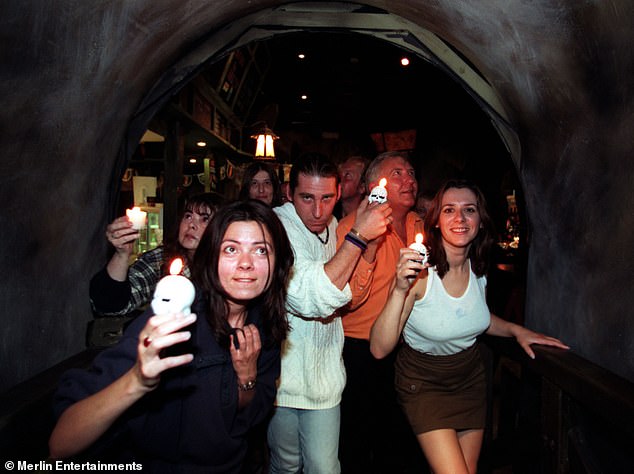 People take part in a ghost hunt at the London Dungeon at its former site on Tooley Street