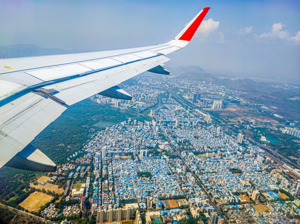 Aerial view of Navi Mumbai from an airplane window.