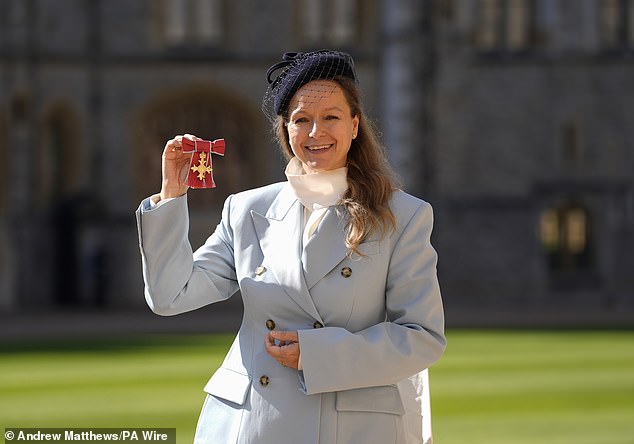 Samantha posed in the historic setting with her medal held high