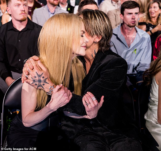 Judi also pointed out that Nicole's 'closed-eyed expression of ecstasy' tells the cameras she's 'in some kind of state of bliss at his touch'
