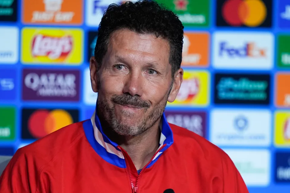 Diego Pablo Simeone, head coach of Atletico de Madrid, smiles during a press conference.