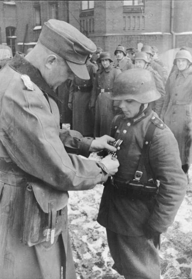 The Hitler Youth was the fascist paramilitary group for children during Nazi rule in Germany. But it was disbanded in 1945, almost 20 years before Mr Farage was even born