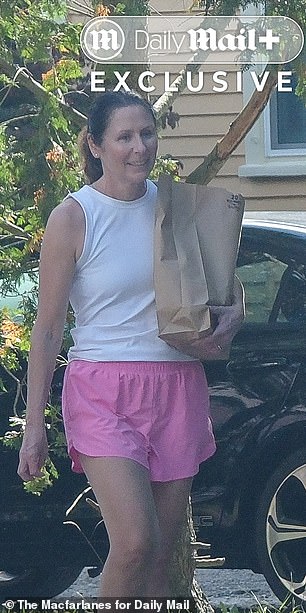 Earlier on Friday, a smiling Megan Byron was seen carrying a bag of groceries to her car