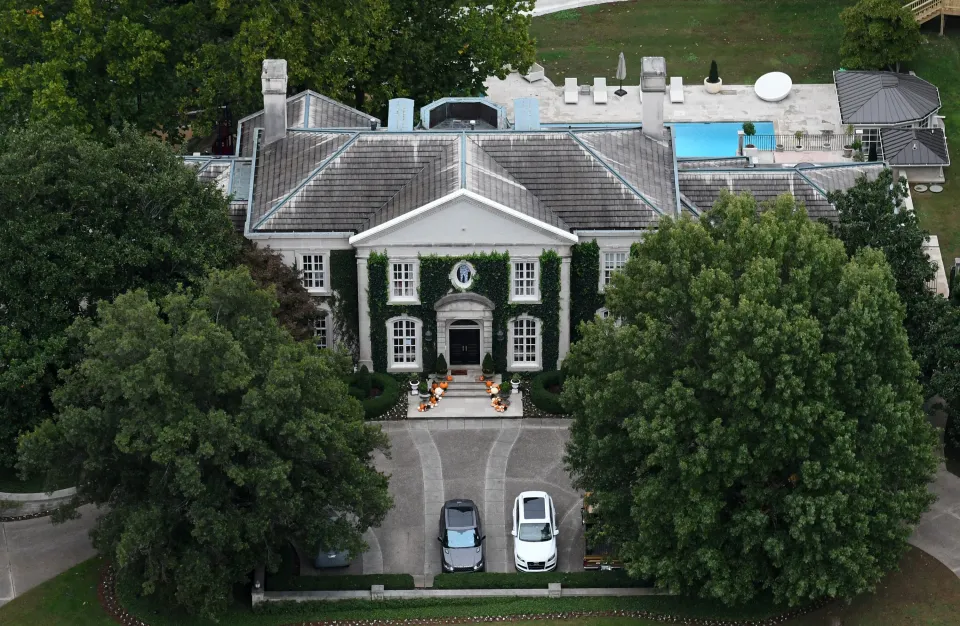 Aerial view of Nicole Kidman and Keith Urban's Nashville house with a tennis court and pool.