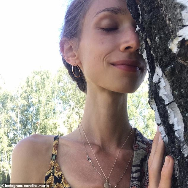 Before she died, Karolina (pictured) weighed as little as 3.5 stone and could barely hold her balance or turn over in bed. Her fingernails had turned yellow and her teeth had begun to rot