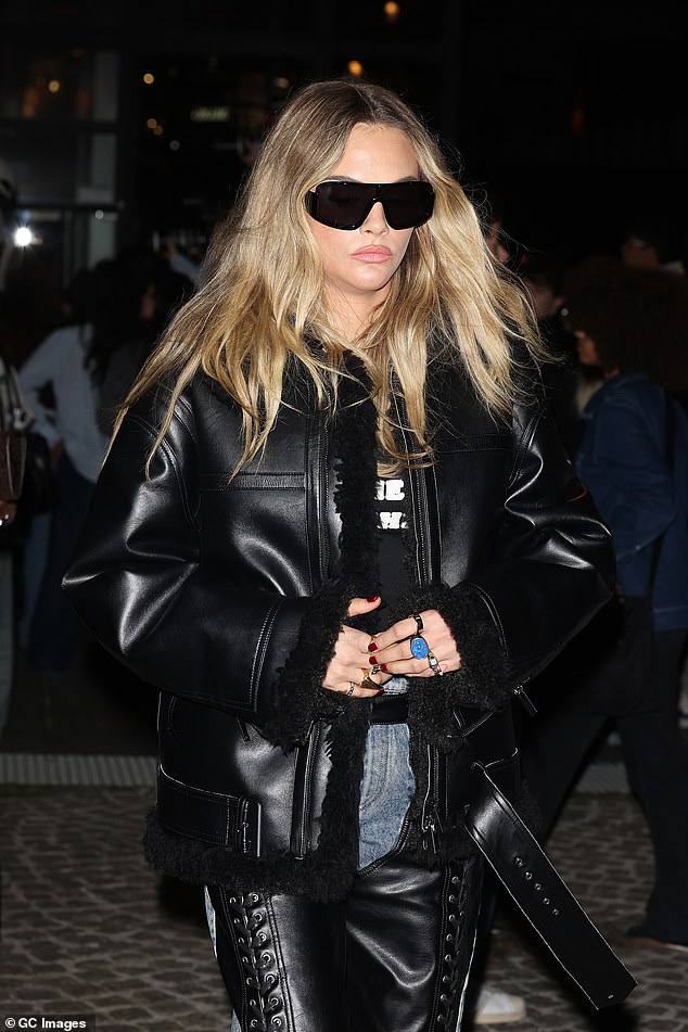 She opted for bold double leather as she headed through the French capital for Stella's show to unveil her Spring/Summer 2026 collection