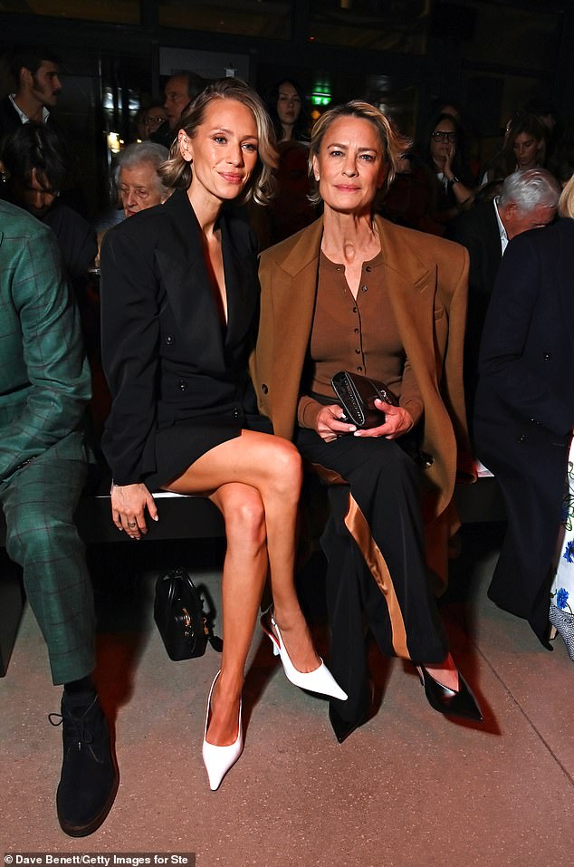 The Forrest Gump star beamed as she joined her daughter Dylan Penn at the fashion show