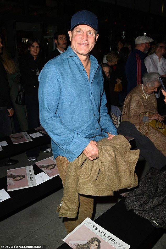 Woody opted for a more casual look as he arrived for the fashion show