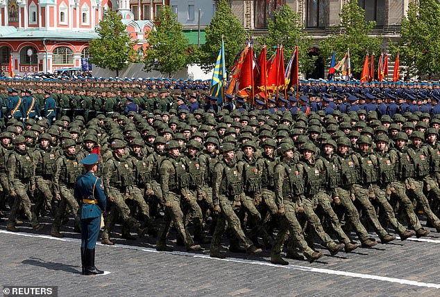 The deadly strikes came as Vladimir Putin ordered Russia's largest autumn military conscription since 2016 as he continues his assault on Ukraine. Pictured: Russian solders are pictured marching in Red Square, central Moscow, on May 9 2025