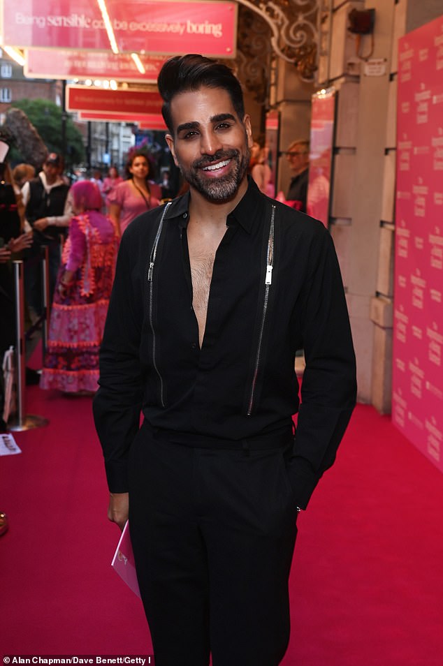 TV doctor Dr Ranj Singh looked dapper in a black suit, though made his look more daring by unbuttoning his shirt, revealing his bare chest