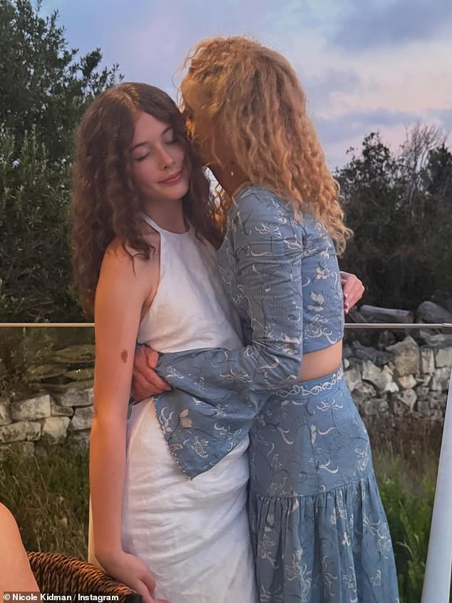 The couple have agreed not to speak badly about each other, and will 'encourage each child to continue to love the other parent and be comfortable in both families' - Nicole pictured with Faith Margaret