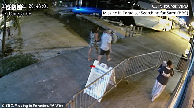 CCTV shows the last sighting of Sarm, recorded six hours before she was reported missing. It shows her and Bane walking down a wooden dock before boarding a dinghy to head back to their luxury yacht anchored in the next bay