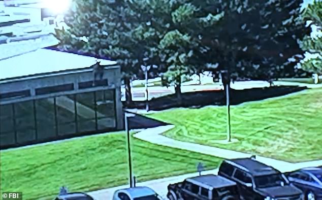 The suspect jumped from the roof of a building after he fired the fatal shot
